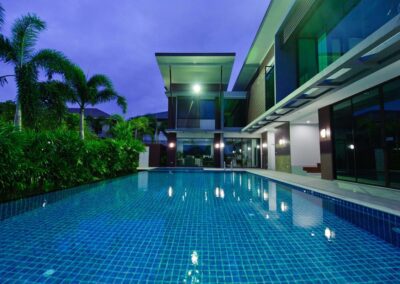 Night View of A House with Swimming Pool